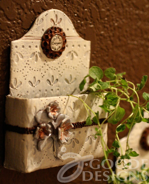 Clay wall hanging flower pot by Jen Goode