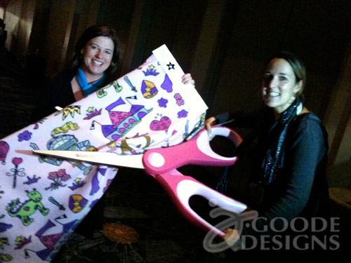 Jen Goode and Laura Kelly using fabric to making pillowcases for Conkerr Cancer